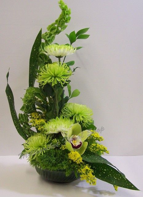 St. Patrick's Theme Get Well | Rhonda | Flickr Asymmetrical Flower Arrangement, Asymmetrical Arrangement, Contemporary Flower Arrangements, Modern Floral Arrangements, Orchid Leaves, Altar Flowers, Gubahan Bunga, Corporate Flowers, Arrangement Floral