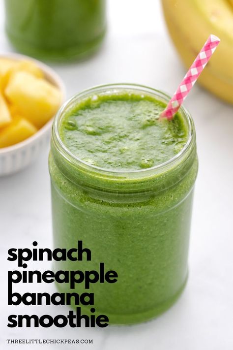 Spinach pineapple banana smoothie in a glass jar with a straw. Pineapple Spinach Smoothie Healthy, Spinach Banana Pineapple Smoothie, Spinach Mango Smoothie Recipes, Pineapple Mango Spinach Smoothie, Spinach Pineapple Smoothie Recipes, Spinach Banana Smoothie Recipes, Spinach Pineapple Smoothie, Arugula Smoothie, Banana Pineapple Smoothie