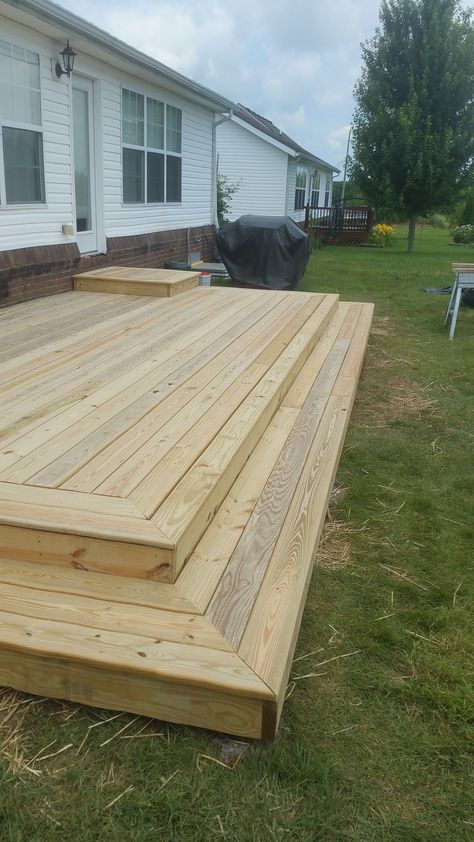 Back Yard Platform Deck - Picture 7045 | Decks.com Deck Low To The Ground, Platform Patio Deck, Low Decks Backyard Ground Level, Wooden Patio Ideas, Platform Deck Ideas, Simple Deck Ideas, Low Deck Designs, 2 Level Deck, Wood Deck Designs