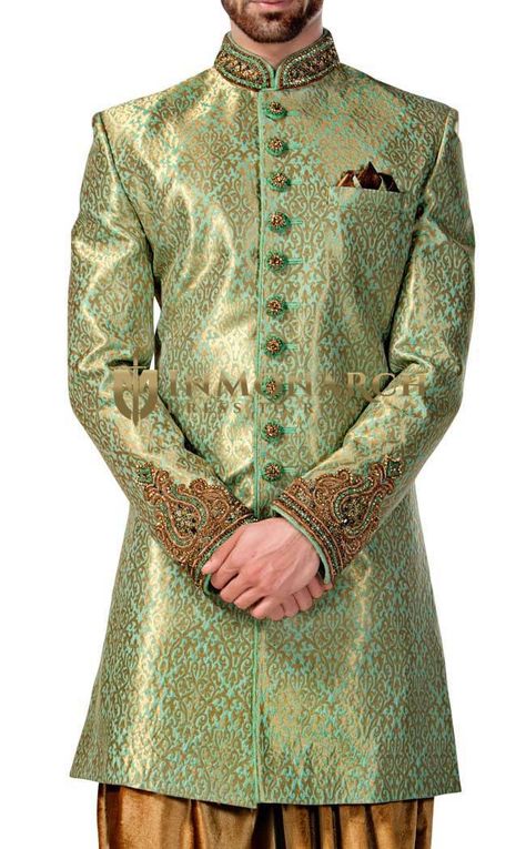 Classic embroidered designer Indo western sherwani 3 Pc (Jacket, Pyjama, pocket square) made from green color brocade fabric. It has bottom as breeches style pyjama made in copper color shimmer fabric. Nawabi For Men, Mens Western Suits, Scarf Brooch, Indian Wedding Clothes For Men, Indo Western Sherwani, Gala Themes, Mens Wear Wedding, Sherwani Groom, Green Wedding Dresses