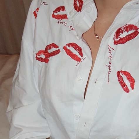 abbode on Instagram: "The kiss button down 💋💋💋 iconic!" White Shirt With Kiss Marks, Kiss Button Up, Fitted Button-up Blouse With Pearl Buttons, White Button-up Tops With Pearl Buttons, Red Button-up Blouse With Button Cuffs, Engagement Inspo, Engagement Inspiration, Engagement Photo Inspiration, Photoshoot Inspiration