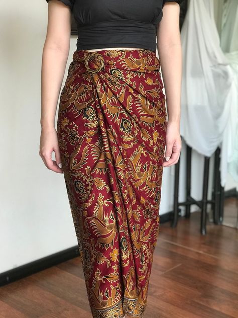 Maroon Bali Batik Instant Wrap Skirt HOW TO STYLE: This is instant wrap skirt, very easy to style.  You can wear this batik wrap skirt from day to night, as a beach cover up or style it with a top for a formal event. You can even turn this skirt into a beautiful dress.  Perfect for Bridesmaid Gift, Valentine's Day Gift, Mother's Day Gift, Birthday Gift for Her. MATERIALS: Cotton Batik with Bird Motif Batik was handcrafted by our local artisans Self Manufactured  Size inclusive❗️Contact us for cu Sarong Wrap Skirt, Wrap Skirt Pattern, Batik Skirt, Bali Beach, Skirt Beach, Sarong Wrap, Festival Pants, Motif Batik, Bird Motif