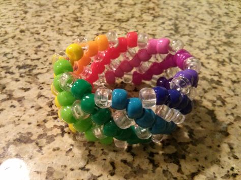 rainbow x-base swirl kandi Kandi Organization, Kandi X Base, X Base Cuff Kandi, Kandi Charms, Rave Kandi Ideas, Kandi Inspiration, Scene Kandi, Pulseras Kandi, Kandi Cuff Patterns