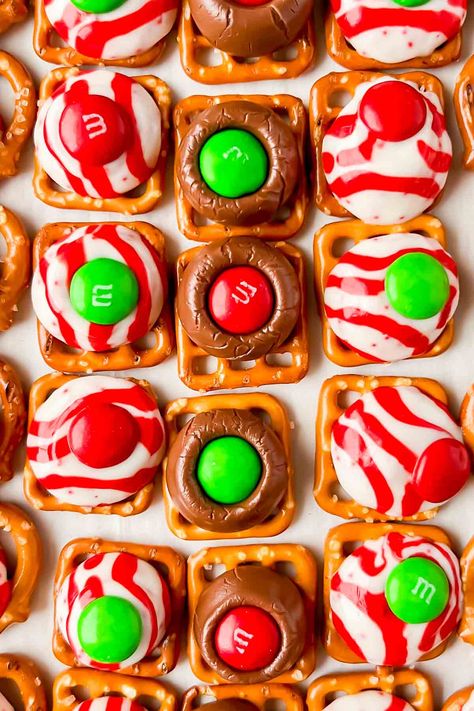 I mean this holiday sweet and salty treat is silly easy! Just a few ingredients to make these Pretzel Hershey Kiss M&M treats and everyone loves them! Pretzel Hershey Kiss, Pretzel Hershey Kisses, Easy Christmas Treats Recipes, Pretzel Kisses, Pretzel Chocolate Bites, Traditional Cookies, Salty Desserts, Christmas Pretzels, Everyday Food Recipes