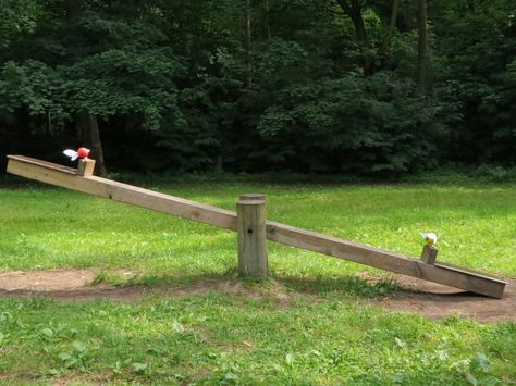 wooden teeter totter Wooden Teeter Totter, Teater Totter Diy, Natural Outdoor Playground, Tire Playground, Church Playground, Outdoor Play Spaces, Teeter Totter, Farm School, Playground Ideas