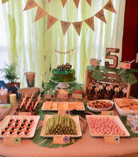 Wild Kratts Birthday Party  | CatchMyParty.com Dinosaurs Birthday Party, Wild Kratts Birthday Party, Wild Kratts Party, Dinosaurs Birthday, Wild Birthday Party, Candy Station, Wild Kratts, Birthday Party Centerpieces, Safari Birthday Party