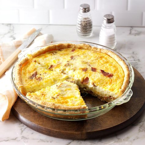 Breakfast Quiche Recipe -I enjoy preparing hearty country breakfasts for the guests at my bed-and-breakfast. This fluffy golden pie, which has lots of cheese and bacon, is a most satisfying entree.—Mark Clark, Twin Mountain, New Hampshire Breakfast Quiche Recipes Easy, Best Quiche Recipes, Bacon And Cheese Quiche, Christmas Breakfast Casserole, Quiche Lorraine Recipe, Breakfast Quiche Recipes, Bacon Quiche, Quiche Recipes Easy, Cheese Quiche