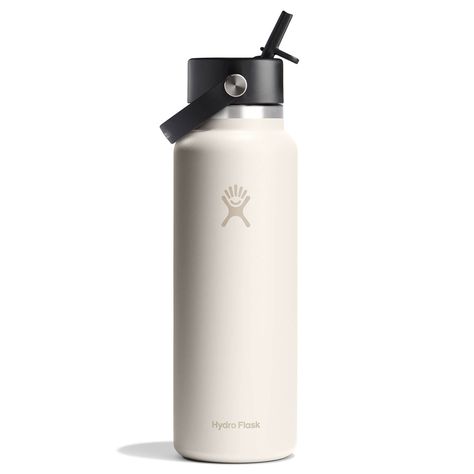 Hydro Flask | 40 Oz Wide Mouth With Flex Straw Cap | Ivory, For Hot and Cold Drinks | From Hydro Flask | Hello, one-handed hydrationA 40 oz Wide Mouth water bottle with our leakproof Flex Straw Cap—easy to fill, easy to drink. Open it up, add your ice, and flip to sip. The insulated stainless steel keeps it cold for up to 24 hours.TempShield®️ double-wall vacuum insulation keeps drinks cold up to 24 hours, hot up to 12Insulated Flex Straw Cap is leakproof when closedMade with 18/8 pro-grade stainless steel for durability, pure taste and no flavor transferWide Mouth opening is ice-cube friendlyColor Last™ powder coat stays clean and colorfulBottle fits most backcountry water filtersBPA-FreeDishwasher safeFlex Straw Cap not intended for use with hot liquidsNot for use on a stove, in a microw Hydroflask Tumbler, Trendy Water Bottle, Big Hydro Flask, Oat Hydroflask, Classy Water Bottle, Waterbottles Hydroflask, Hydro Flask Aesthetic, Hydroflask Aesthetic, Hydro Flask