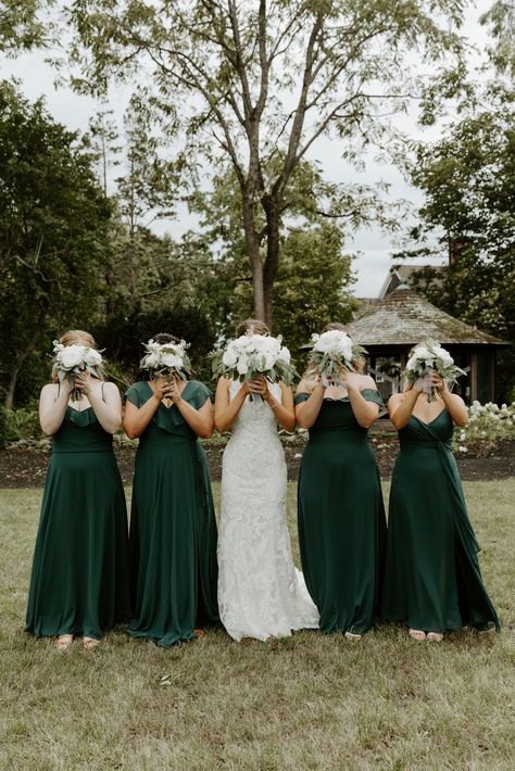 This romantic summer wedding had a timeless green and navy wedding color palette. The groom wore a navy suit and the bridesmaids wore hunter green bridesmaid dresses. The wedding flowers were white with eucalyptus and the bride wore a stunning lace wedding gown. The couple even included their dog in their wedding photos! See more on the blog! Pine Green And Navy Wedding, Navy And Dark Green Wedding, Blue Wedding Tablecloth, Forest Green And Navy Wedding, Hunter Green Wedding Colors, Emerald And Navy Wedding, Green And Navy Wedding, Navy Blue Wedding Colors, Bridesmaid Dresses Navy Blue