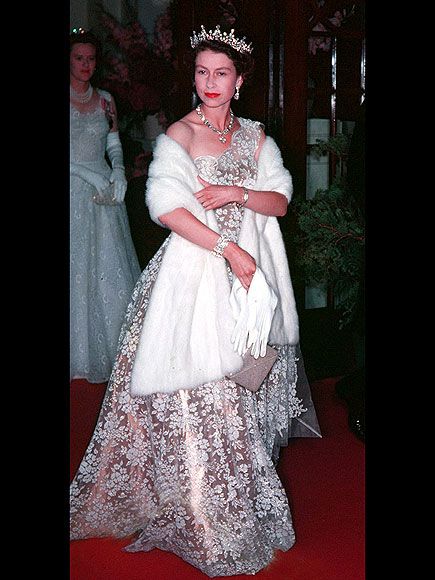 Queen Elizabeth in high style, her shimmering rose gold one-shoulder gown with floral embroidery, plus a striking tiara and white fur, embodied regal glamour. Young Queen Elizabeth, Rainha Elizabeth Ii, Reine Elizabeth Ii, Hm The Queen, Reine Elizabeth, Mode Chanel, Elisabeth Ii, Reina Isabel Ii, Royal Queen