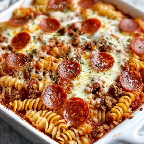 Baked Pizza Spaghetti is the perfect combination of pizza and pasta, with ground beef, pepperoni, and lots of mozzarella cheese baked into a deliciously cheesy dish. Pepperoni Baked Ziti, Baked Pasta With Pepperoni, Pizza Hot Dish Recipe, Pepperoni Pizza Bake, Pepperoni Pasta Recipes, Pizza Spaghetti Bake, Cheesy Beef Pizza Casserole, Baked Pizza Casserole, Pepperoni Pasta Casserole