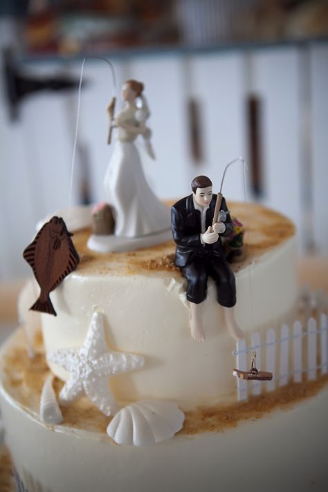 Fishing Cake toppers from our wedding- bride with halibut and groom with boot......my groom usually gets skunked so this would be funny Fishing Cake Toppers, Fishing Wedding Cake, Fly Fishing Wedding, Fishing Wedding Cakes, Fishing Wedding Cake Toppers, Fishing Themed Wedding, Fishing Cake Topper, Fishing Cake, Porcelain Wedding