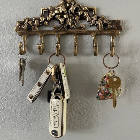 "Adding a touch of Victorian elegance to your space with this brass Victorian hook 🏡✨ #VictorianDecor #BrassBeauty #HomeInspiration #InteriorStyling #TrendyHome #DecorGoals #VintageCharm #InteriorDesign #HomeRenovation #DecorInspo" Boho Key Holder, Key Hooks Entryway, Brass Coat Hooks, Hanging Items, Key Holder For Wall, Brass Wall Hanging, Hat Hook, Antique Aesthetic, Victorian Wall