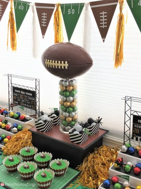 Football Treat Table Ideas, Football Themed Table Centerpieces, Football Party Candy Table, Chargers Football Theme Party, Football Banquet Table Decorations, Senior Football Table Ideas, Football Theme Centerpieces, Football Signing Day Table Ideas, Football Party Table Decorations