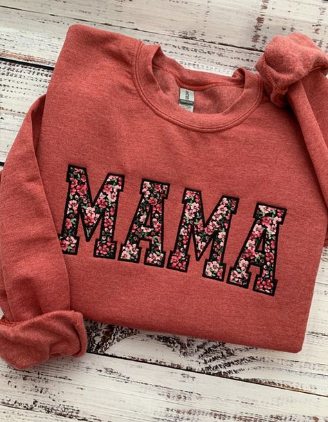 Mama Sweatshirt-Custom Embroidered Sweatshirt-Mother's Day Gift-Custom Sweatshirt-Crewneck Sweatshirt-Gift for Mom-Mom Gift-Mom Sweatshirt-Gift for Her-Mama Custom Embroidered MAMA Sweatshirt makes for a great gift for Mom.  This custom sweatshirt also makes for the perfect Mother's Day Gift. This crewneck sweatshirt is super soft, unisex in size and makes for a spectacular gift for her (or anyone). Main photo shows Heather Scarlet Mama sweatshirt with Pink Floral fabric and Black satin stitch e Mama Crew Neck Sweatshirt, Mom And Me Fall Shirts, Mama Sweatshirt With Onsie, Fall Mama Sweatshirts, Mama Sweater With Baby Clothes, Mama Onesie Sweatshirt, Personalized Mama Sweatshirt, Momma Sweatshirt Ideas, Dog Mama Sweatshirt