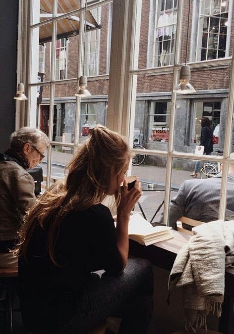 Reading or writing in a cozy coffee shop cafe Cozy Coffee Shop, Coffee Shop Aesthetic, Les Brown, Coffee Girl, People Running, Woman Reading, Academia Aesthetic, Coffee Cozy, Coffee And Books