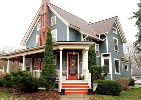 Victorian With Wrap Around Porch, Blue House Wrap Around Porch, Wrap Around Porch Cottage, Aesthetic Wrap Around Porch, Brick House Wrap Around Porch, Victorian House Paint Exterior, Half Wrap Around Porch, Vintage Homes Exterior, Houses With Wrap Around Porches