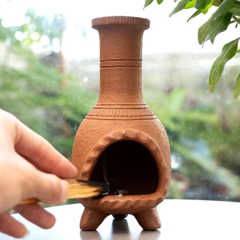 PRICES MAY VARY. Handcrafted Excellence: Elevate your space with our exquisite Palo Santo Holder! Handcrafted with care, this terracotta "chimney" adds a touch of warmth and charm to any room, indoor or outdoor. Perfect for decoration or burning incense, sage, or candles in small, cozy spaces like a living room or study Versatile Use: Embrace the beauty of Mexican minimalist design with this unique clay Chiminea, ideal for burning tea lights, incense, palo santo, or sage. Add a touch of Mexican Chimney Incense Burner, Ceramic Tealight Holder, Clay Spoon Holder, Polymer Clay Incense Holder, Air Dry Clay Candle Holder, Clay Altar, Polymer Clay Candle Holder, Terracotta Ideas, Clay Chiminea