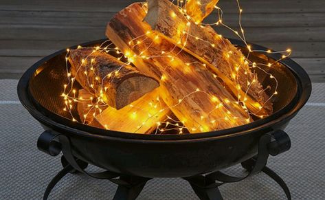 Glimmer lights Iron Fire Pit, Summer Lighting, Fire Wood, Outdoor Side Tables, Outdoor Side Table, Outdoor Coffee Tables, Fire Pit Table, Rustic Wedding Decor, Inspired Homes