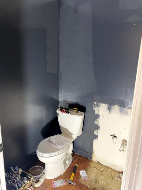 Our DIY Small Bathroom Makeover on a Budget - Full Hearted Home Midnight Blue Powder Room, Navy Blue Small Bathroom Ideas, Small Blue Powder Room Ideas, Two Tone Powder Room, Half Bathroom Ideas On A Budget, Small Bath Paint Colors, Fun Half Bathroom Ideas Wallpaper, Navy Blue Half Bathroom, Small Navy Blue Bathroom