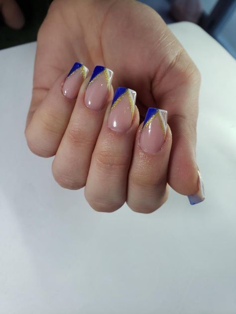 french nails with blue white and gold detalis 2022 nails Blue Gold French Tip Nails, Short Acrylic Nails For Cheer, Blue And Gold Square Nails, Royal Blue And Gold Acrylic Nails Short, Royal Blue White And Gold Nails, Nails With Blue And Gold, Blue And Gold Nail Designs Short, White And Royal Blue Nails Acrylic, Nail Art Designs Blue And Gold