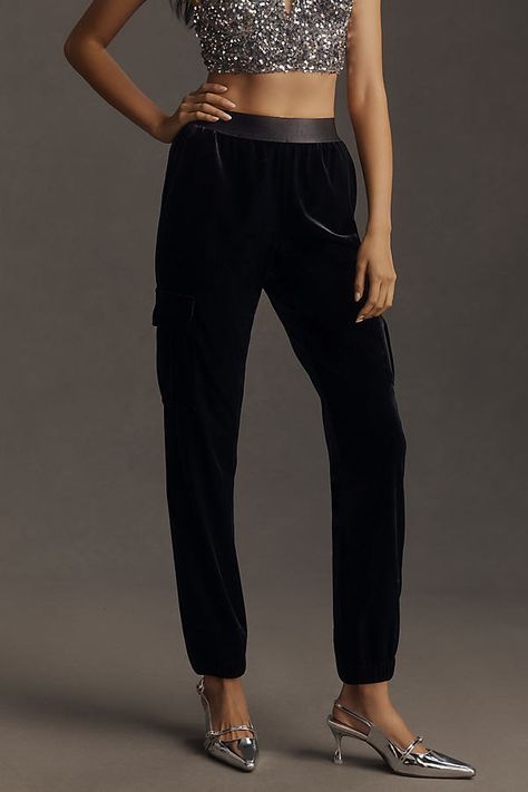 Polyester, elastane Side slant pockets Side cargo pockets Back welt pockets Pull-on styling Machine wash Imported | Fixer Velvet Joggers Pants by Sanctuary in Black, Women's, Size: XL, Polyester/Elastane at Anthropologie East Coast Fashion, Velvet Joggers, Joggers Pants, Girl Silhouette, California Style, Black Fits, Welt Pockets, Jogger Pants, Welt Pocket