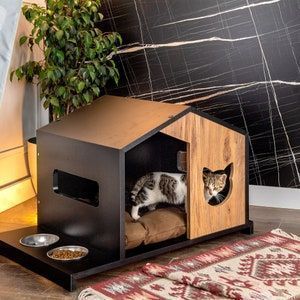 Nestled in Amazon's cat beds, a tale of comfort is told. Cat House Indoor, Modern Dog Houses, Chat Diy, Wooden Cat House, Cat Houses Indoor, Wooden Dog House, Cat Kennel, Outdoor Dog House, Cat House Diy