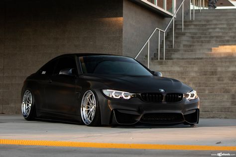 Stanced Blacked out BMW 4-Series Shod in Contrasting Chrome Rims Blacked Out Bmw, Bmw E30 Stance, Bmw M4 Coupe, Bmw 328i Coupe, Bmw Red, Bmw M4 F82, Bmw M Series, F82 M4, Black Bmw