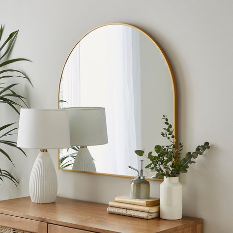 * Chic wall mirror * Timeless design * Easy to clean * Wall fixings not included Presenting our Essentials Arch Mirror, a timeless 70x70cm addition to your indoor space. Its elegant arch design effortlessly complements any decor style. Maintaining its pristine look is a breeze – just a quick wipe with a damp cloth, and it's good as new. Please note, wall fixings are not included, as they vary by wall type. But fear not, our Essentials Arch Mirror is equipped with sturdy D rings, ensuring easy ha Gold Arch Mirror, Dramatic Walls, Mirror Decor Living Room, Interior Design Tools, Hallway Mirror, Arched Mirror, Art Deco Mirror, Classic Interior Design, Arch Mirror