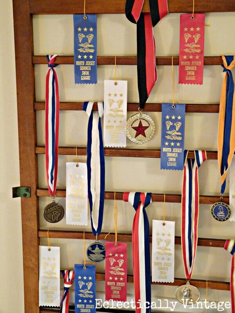 Creative way to display old 4-H or FFA ribbons Upcycle Crib, Award Ribbon Display, Crib Spring, Herb Drying, Ribbon Display, Ribbon Holders, Wall Vents, Medal Ribbon, Award Display