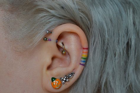 Rainbow Neck Tattoo, Ear Rainbow Tattoo, Ear Tattoo Rainbow, Lgbtq Couple Tattoos, Pride Ear Tattoo, Rainbow Ear Tattoo, Bisexual Tattoo, Pride Tattoo Ideas, Ears Tattoo