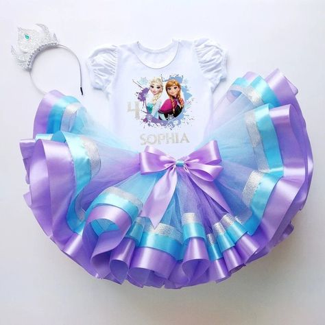 Your birthday girl will look adorable wearing her Frozen themed t-shirt, headband and tutu set. This birthday outfit comes in a wide range of sizes from toddlers to older girls in your choice of short or long bodysuit sleeves. Purple Toddler Dress, Frozen Birthday Party Decorations, Elsa Tutu, Make Outfits, Frozen Outfits, Disney Princess Outfits, Elsa Birthday, Bombshell Dress, Toddler Parties