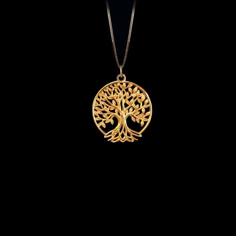 Embrace the harmony and interconnectedness of nature with our Tree of Life Pendant. Crafted in America with exquisite detail, this gold masterpiece symbolizes growth and renewal. Feel the nurturing energy of 14k and 18k solid gold, representing strength and vitality. Adorn yourself with this captivating piece and connect with the timeless essence of life itself. 𝗣𝗘𝗡𝗗𝗔𝗡𝗧 𝗜𝗡𝗙𝗢𝗥𝗠𝗔𝗧𝗜𝗢𝗡 This pendant is made of real, solid gold. * Made in USA * Size: 𝗠𝗜𝗡𝗜 * Material: 14k or 18k solid gold * Finish: polished * Height: 0.9" (22,5 mm) | *includes the small circle, bail dimensions not included * Width: 0.79" (20 mm) * Pendant weight (approx.): 3 grams (14k) * Bail: fits up to 4 mm chains * Solid back, not hollow * A certificate of authenticity is included * Delivered in our ele Gold Tree Of Life, April Crafts, Arabic Jewelry, Necklace Tree, Mini Tree, Timeless Symbol, Life Itself, Celtic Tree, Gold Tree