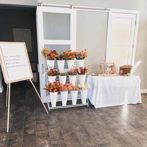 🌸 INTRODUCING: a new addition to my “for rent” inventory - the Bouquet Bar! We provide everything - the flowers, the ribbons, the bouquet wraps, the signs, the workstation, everything. We deliver + pick up. #EasyPeasy It had its first outing at a baby shower today, look at it sitting there all cute. 🥹 Perfect for all events - weddings, bridal showers, birthday parties, baby showers, backyard soirées, etc. INTERESTED in booking this for your event? Reach out for availability and prices. ... Bar For Events, Bouquet Bar, Make A Bouquet, Making A Bouquet, Bouquet Wrap, Now Booking, I Understand, New Growth, Bridal Showers