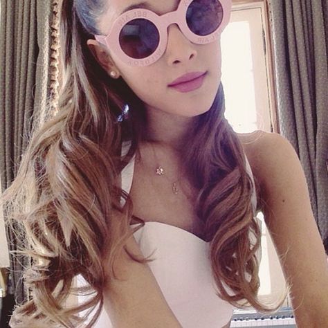 Ariana Grande Shows Off Her Sunglasses Style Ariana Grande, A Woman, Sunglasses, Hair, Pink, White