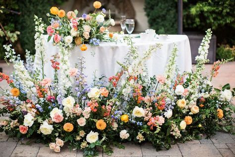 2023 Wedding Florals, Where To Put Flowers At Wedding, Colorful Wedding Pastel, Spring Garden Wedding Flowers, Head Table Florals Wedding, Summer Color Wedding Theme, Wedding Flowers Multicolor, Outside Wedding Decorations Summer, California Wedding Flowers