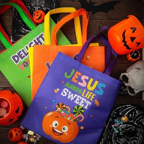 Cute and Unique Pattern Design: our Halloween religious theme tote bags trick or treat gift bags are decorated with various and colorful patterns, including cartoon pumpkin pattern, candy pattern, etc, printed with [JESUS IS SO SWEET], [JESUS MAKE LIFE SO SWEET], [DELIGHT YOURSELF IN JESUS] pattern, vibrant colors and Halloween themed patterns make them eye catching, cute and creative, 
#ad Christian Halloween Gifts, Halloween Trick Or Treat Bags, Christian Halloween, Halloween Gift Bags, Easter Treat Bags, Halloween Apparel, Festival Ideas, Easter Bags, Easter Religious