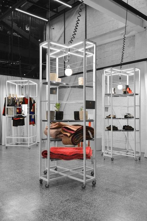 A New Retail & Events Space in Tehran Explores Modular Minimalism | Yatzer Small Store Interior, Modular Display, Retail Space Design, Retail Fixtures, Showroom Interior Design, Retail Store Design, Store Design Interior, Store Interior, Tehran