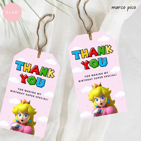 "Princess Peach themed Party Favors Tags, Super Mario Peach Birthday Thank You Label, Peach Super Mario Birthday Party Gift Thank You Tag Create your personalized birthday party with Peach Super Mario themed thank you tags! Download, print or send online. Easy to customize, using our editable template design.  MATCHING ITEMS: Birthday Invite: https://www.etsy.com/ca/listing/1540652219/peach-themed-birthday-invitation Welcome Sign: https://www.etsy.com/listing/1570355663/peach-themed-birthday-welcome-sign Thank You Card: https://www.etsy.com/listing/1595967448/peach-super-mario-themed-thank-you-card No physical product will be sent to you. THIS IS AN INSTANT DOWNLOAD EDITABLE TEMPLATE FOR SELF-PRINTING.  HOW IT WORKS ? After purchasing, you will automatically receive access to a PDF file wi Princess Peach Party Invitations, Super Mario Peach Birthday Party, Mario Birthday Party Girl, Princess Peach Party Favors, Princess Peaches Birthday Theme, Princess Peach Party Decorations, Princess Peach Birthday Party, Princess Peach Birthday, Pink Princess Birthday Party