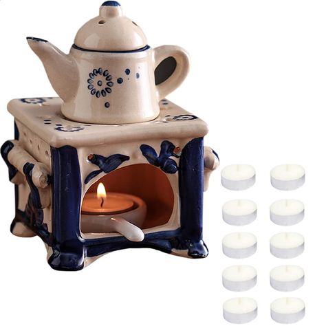 PRICES MAY VARY. HIGH-QUALITY MATERIAL - Our aromatherapy stove is made of high-quality ceramic material, high-temperature firing, hand-painted, exquisite workmanship, delicate texture, and durability EXQUISITE SHAPE - This lovely essential oil stove features a small teapot and stove shape with delicate patterns and beautiful details. Hollow-out design, candle light penetrates the furnace body, which is both ventilated and beautiful. Four-legged base design, more stable placement EASY TO USE - Y Hollow Form Ceramics, Tea Light Holder Ideas, Creepy Ceramics, Clay Oil Burner, Balcony Yoga, Valentine Bedroom, Ceramic Wax Melter, Witchcraft Stuff, Oil Stove