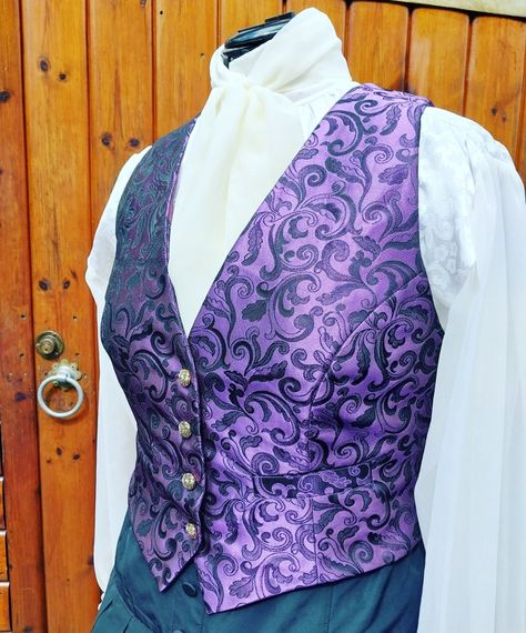 A purple brocade ladies waistcoat modelled on a dress form. Worn with a cream high necked blouse with a chiffon bow tie scarf Purple Academia, Purple Waistcoat, Gentlemen Jack, Women's Waistcoat, Victorian Vest, Jack Halloween, Womens Waistcoat, Purple Vest, Vest Outfits For Women