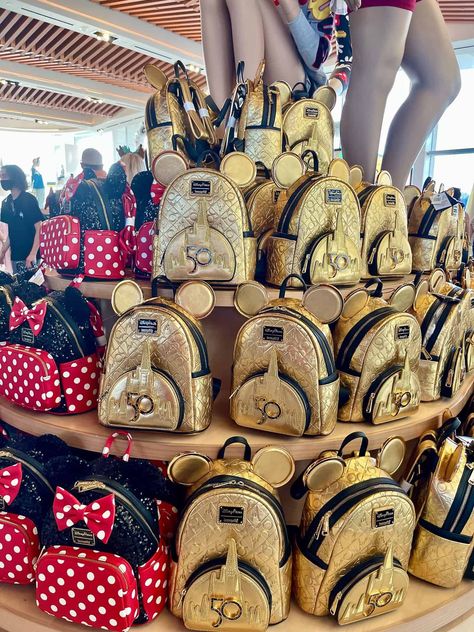 How much would you spend on a Loungefly backpack? If you’re like most Disney fans, then probably no more than $100, right? Of course, when you really fall in love … Disney Loungefly Backpack Display, 50th Anniversary Logo, Loungefly Backpack, Disney Souvenirs, 50th Anniversary Celebration, Disney Bags, Disney Instagram, Anniversary Logo, Loungefly Bag