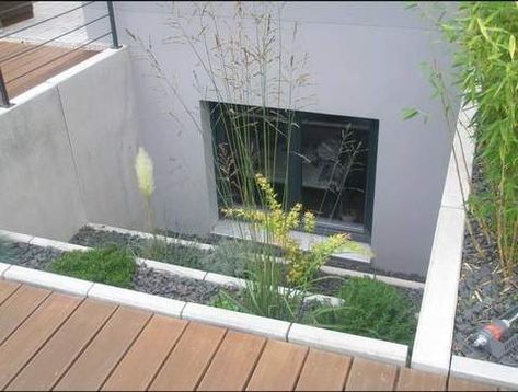 16 Egress Window Well Ideas to Inspire - The Great Egress Co Egress Window Landscaping, Egress Window Well, Steep Gardens, Basement Window Well, Dark Basement, Pebble Floor, Egress Window, Window Well, Basement Windows