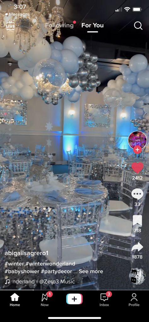 Winter Wonderland Quince Centerpieces, Winter Land Quinceanera, Sweet 16 Blue And Silver Theme, Snowflake Quinceanera Theme, Ice Princess Sweet 16, Silver And Blue Quinceanera Decorations, Blue Butterfly Themed Sweet 16, Sweet 16 Dresses Winter Wonderland, Winter Wonderland Themed Quinceanera