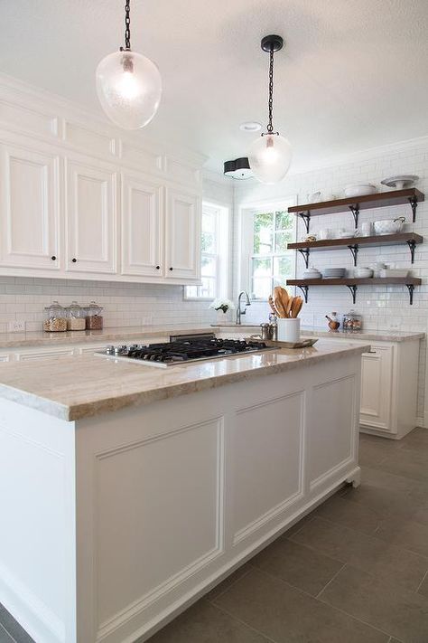 Amazing kitchen features white cabinets paired with Taj Mahal Quartzite countertops and a white subway tiled backsplash. Floor Tile Ideas, Best Flooring For Kitchen, Flooring Designs, Kitchen Floor Tiles Ideas, Kitchen Top, Farmhouse Kitchen Remodel, Diy Kitchen Remodel, Unique Flooring, Classic Kitchen