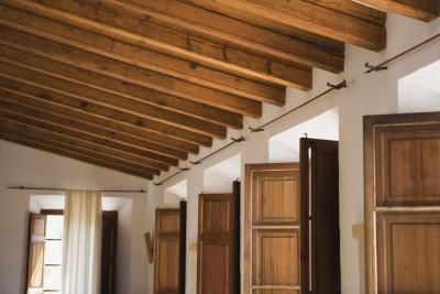 A frame with salt box roof house | cathedral ceiling lacks the ceiling joists of conventional framing. Finish Basement Ceiling, Basement Ceiling Options, Low Ceiling Basement, Exposed Beams Ceiling, Ceiling Options, Wooden Ceiling Design, Types Of Ceilings, Exposed Rafters, Tongue And Groove Ceiling