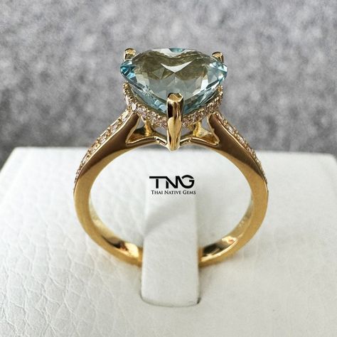 The first Heart Shape Aquamarine Ring is GIA-certified 2.76 carats set with halo & side natural diamonds in 18K Yellow Gold! . . . #thainativegems #heartshapering #18K #heartshapeaquamarine #heartshaped #aquamarine #aquamarinering #gemstonering #gems #gemstones Heart Shaped Rings, Aquamarine Ring, Aqua Marine, Aquamarine Rings, Heart Shape, Aquamarine, Natural Diamonds, Halo, Heart Shapes