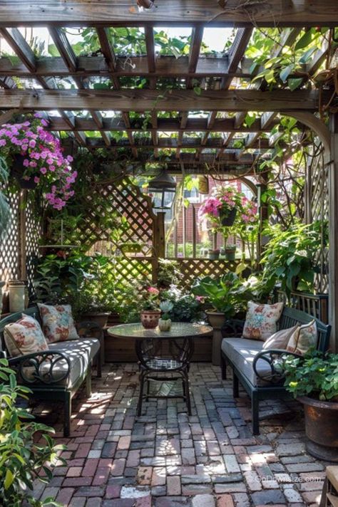 In this cottage-core patio, the diamond pattern trellis brings a rustic charm that blends perfectly with the natural vibe of the surroundings and the bricked flooring. Cottage Core Patio, Cottage Core Backyard, Cozy Courtyard, Cottage Core Garden, Trellis Ideas, Tiny Balcony, Garden Nook, Courtyard Gardens Design, Outdoor Sitting Area