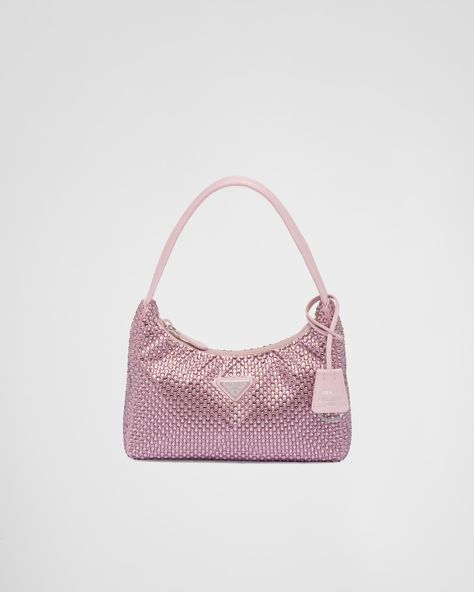 This mini hobo bag, an iconic Prada style, comes in a luxurious satin version studded with crystals and decorated with the emblematic enamel triangle logo. Pink Sparkly Prada Bag, Prada Crystal Bag, Mini Hobo Bag, Prada Style, Prada Collection, Crystal Bags, Pink Sparkly, Triangle Logo, Pink Satin