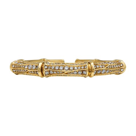 14,000€ A 750/000 yellow gold Cartier vintage flexible bracelet, "Bamboo" collection. Three of the bamboo motifs are set with brillant cut diamonds. Cartier Bracelet Price, Cartier Watches Women, Cartier Vintage, Bracelet Cartier, Shop In Paris, Flexible Bracelet, Cartier Bracelet, Paris Shopping, Cartier Jewelry